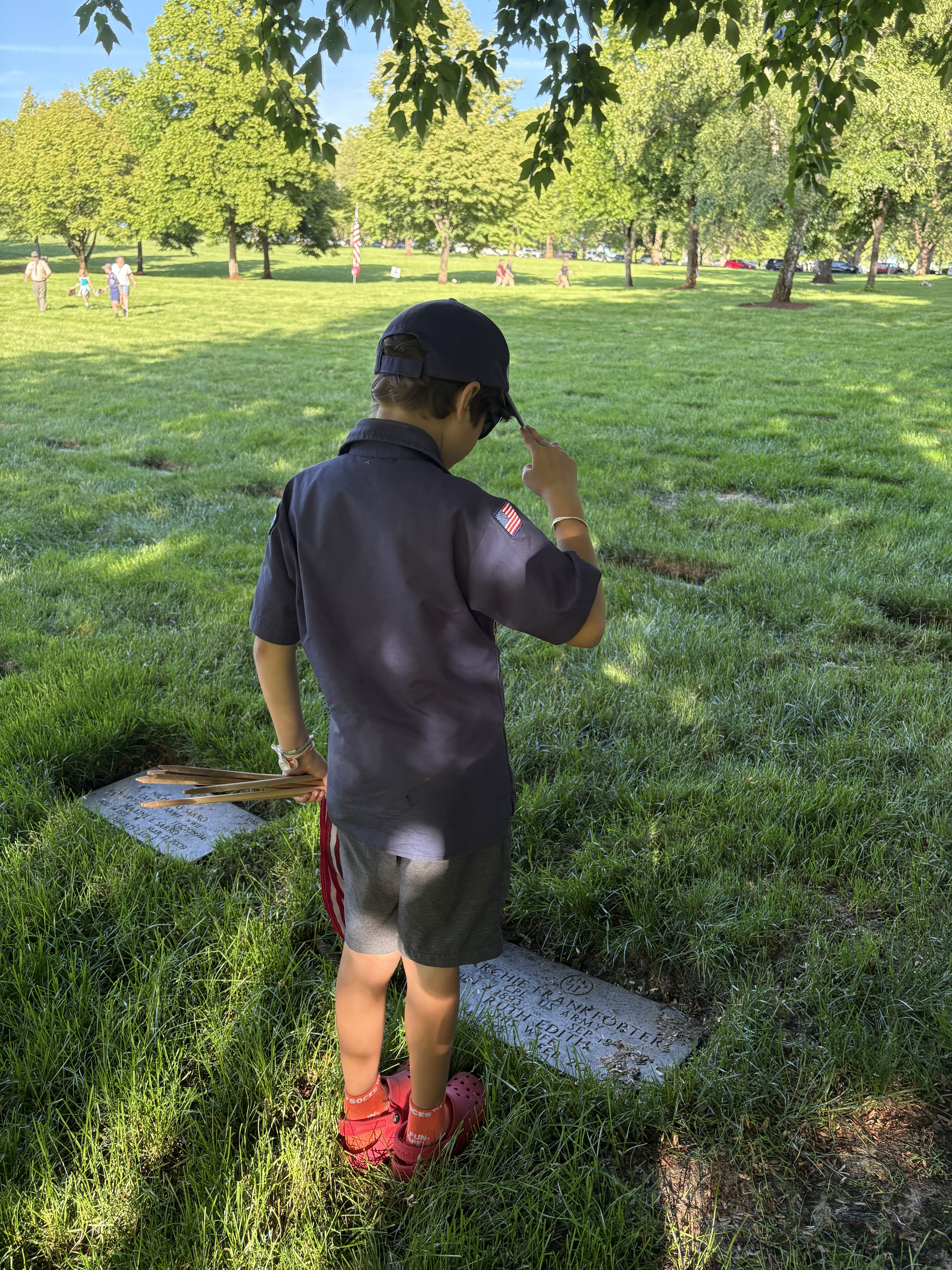 Scouts saluting